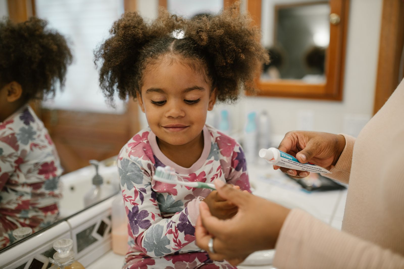 Child brushing teeth at home