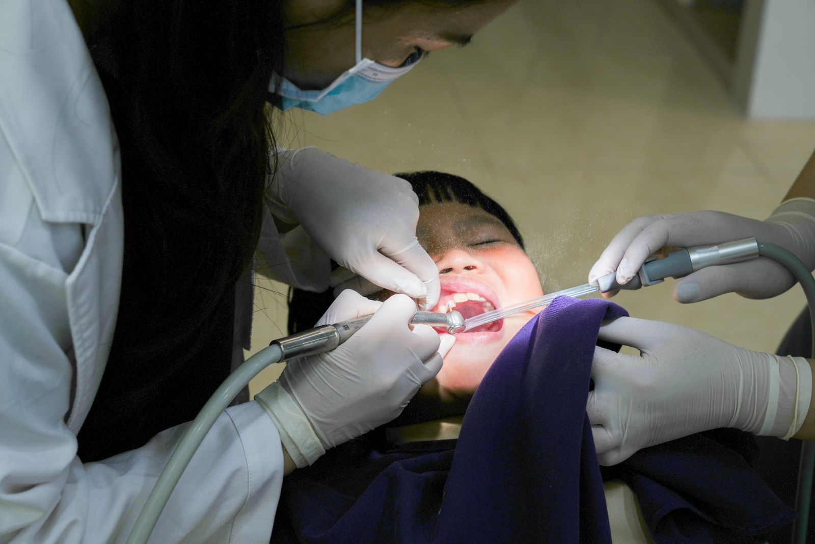 Young child receiving gentle dental care